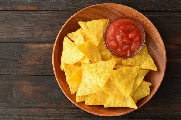 Tortilla Chip Day. Bowl for tortilla chips with salsa dip