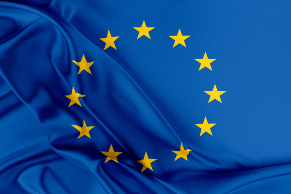 Flag of Europe with yellow stars against blue background for Europe Day