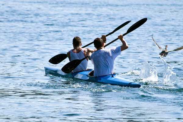 Two people in a double canoe for National Go Canoeing Week