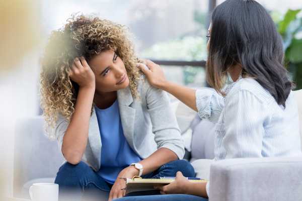 Lady talking to a counselor for Mental Health Awareness Week