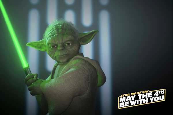 Yoda holding a lightsaber for Star Wars Day. text says may the 4th be with you