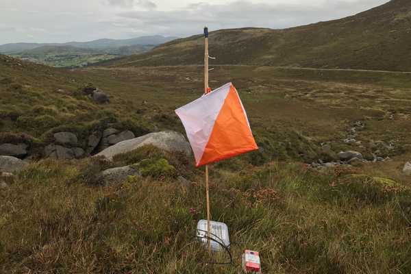 Orienteering flag in the mountains for World Orienteering Week