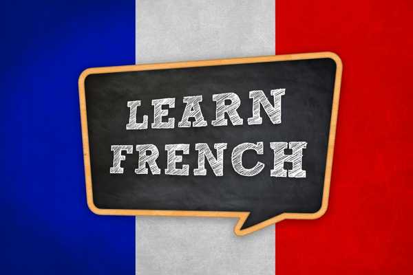 French flag with the words "learn french" overlayed for French Language Day