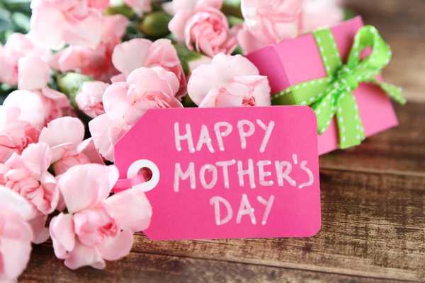 Pink flowers with a Mother's Day sign