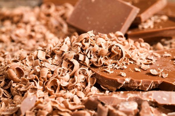 Milk chocolate bars and shavings for National Milk Chocolate Day