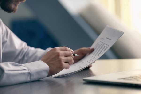 Person reading a page for Proofreading Day