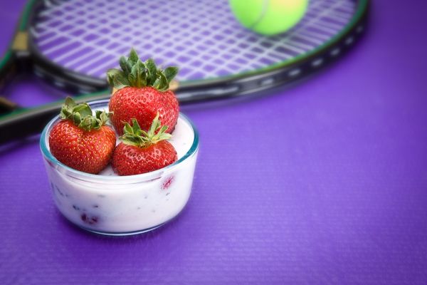 Tennis racket and strawberries for Wimbledon Starts