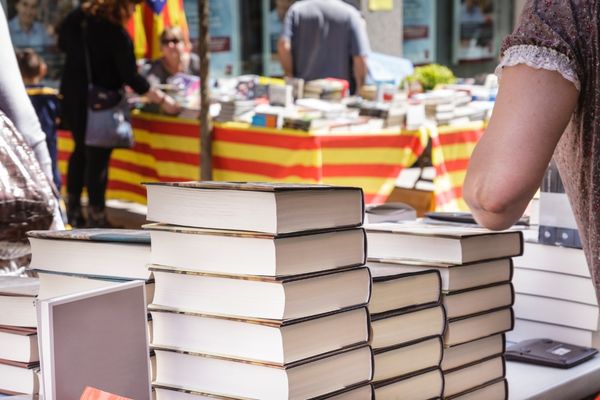 Pile of books at a market stall for Edinburgh International Book Festival