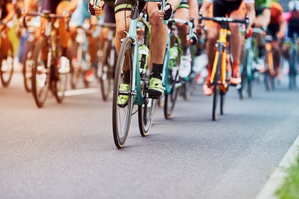 Road cyclists cycling on a road for UCI Road World Champs (Cycling)