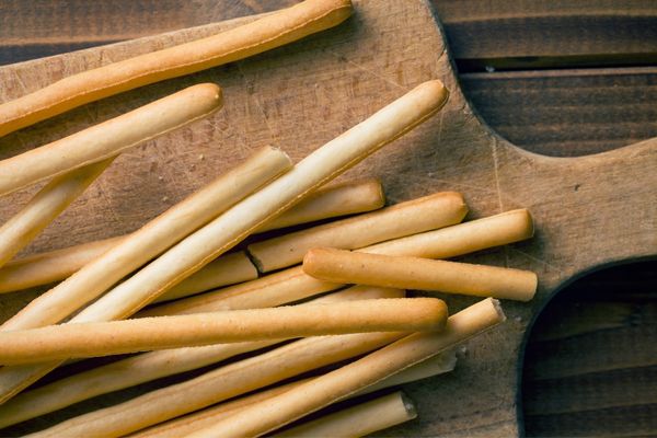 Array of breadsticks on a table for Breadstick Day