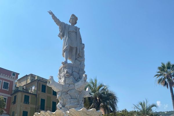 Statue of Christopher Columbus against blue sky for Columbus Day
