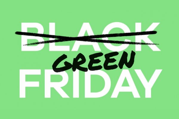 Bright green background with "Black Friday" written in white. "Black" has been crossed out with a black cross and replaced with "Green" for Green Friday