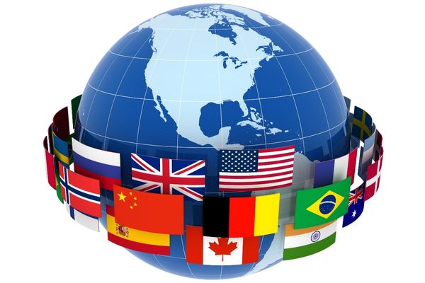 Graphic of globe surrounded by international flags for International Translation Day