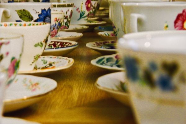 Row of cups and saucers for Mad Hatter Day