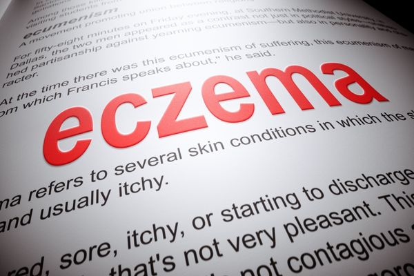 Photograph of medical notes with "Eczema" in bold red type for National Eczema Week