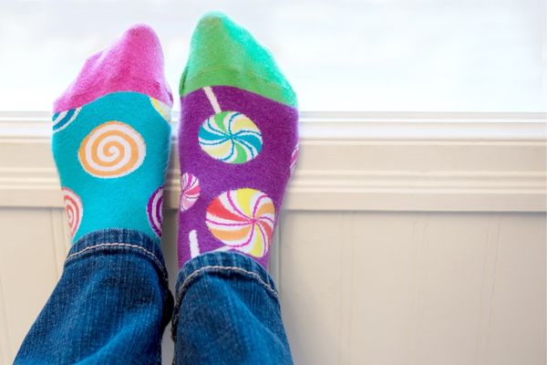 Feet wearing odd socks for Odd Socks Day