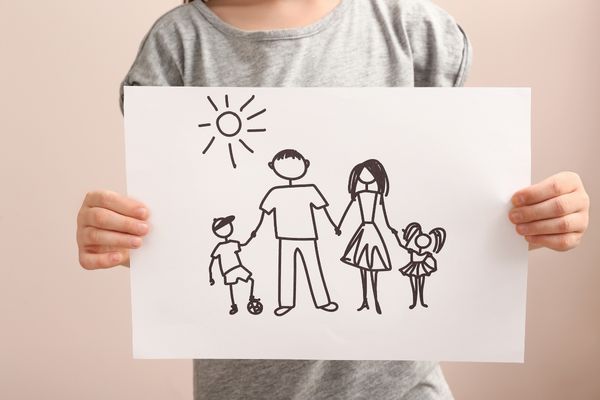 Drawing of a family, 2 parents and 2 children for World Adoption Day