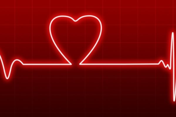 Neon heartbeat graphic for World Heart Day