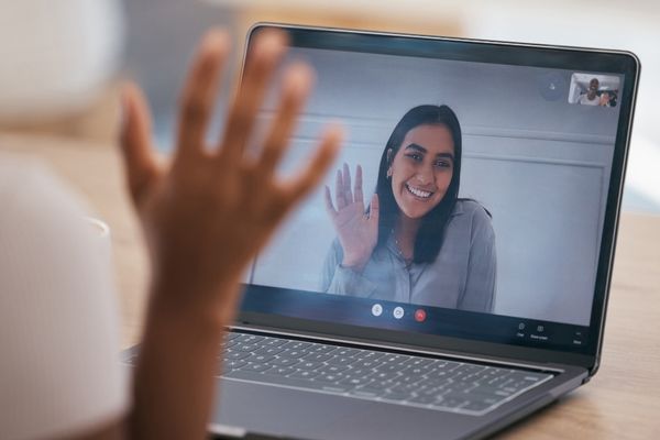 Laptop showing a Zoom conversation for World Online Networking Day