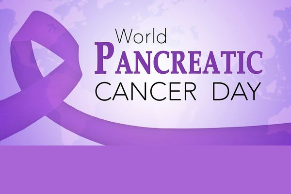 Image of purple ribbon with text reading "World Pancreatic Cancer Day"