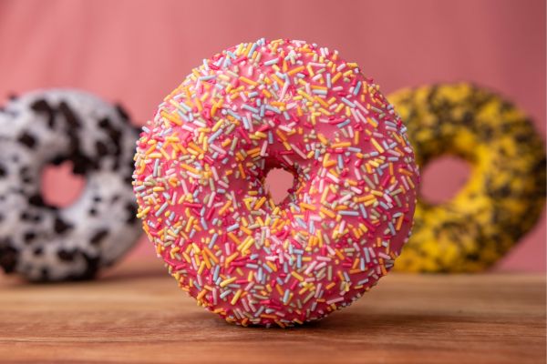 Pink sprinkle doughnut for National Doughnut Day