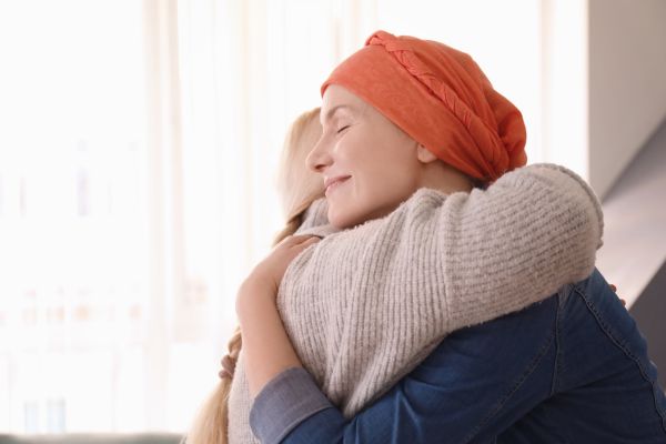 Two women hug on Chronic Lymphocytic Leukaemia Day