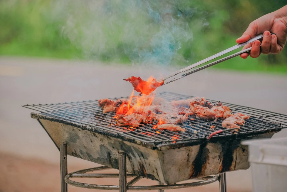 hands near a bbq for burn awareness day